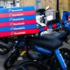 Domino's pizza boxes stacked to be delivered