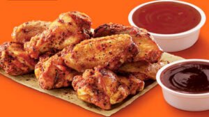 Little Caesars chicken wings and sauce